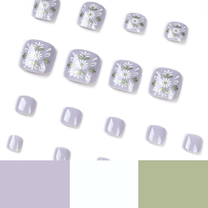Artistic toenail design with elegant floral design Kalsten