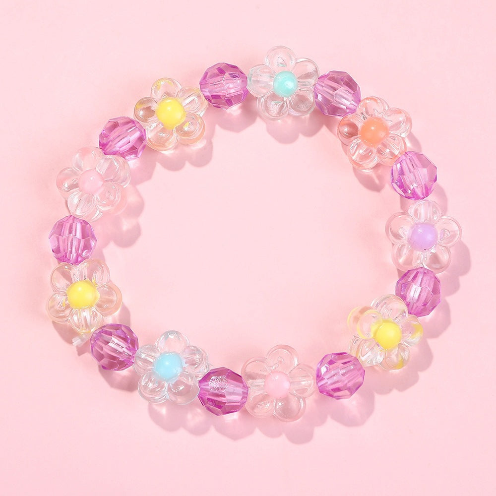 Friendship bracelet with colorful flower motifs Kalsten
