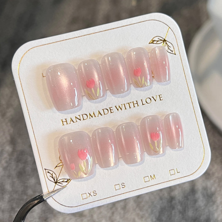 Artificial nail art with floral decorations Kalsten