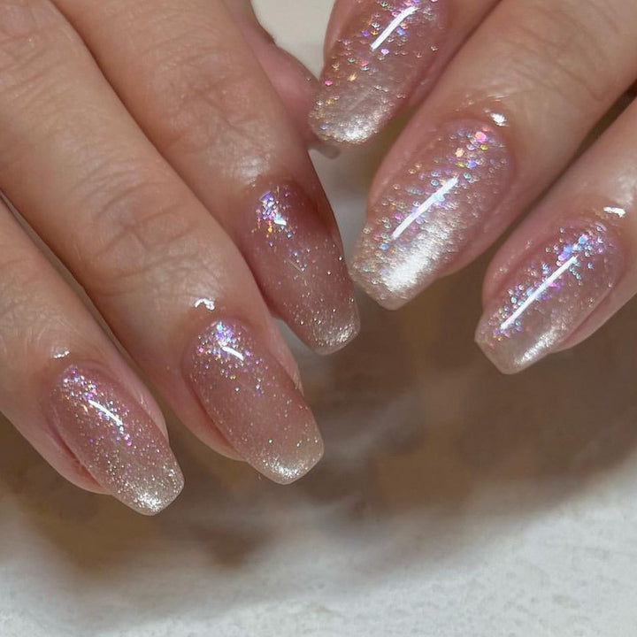 Glamorous artificial nails with glitter and ombre design Kalsten