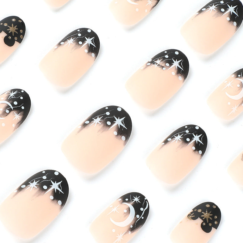 Artistic nail art with moon and star motifs Kalsten