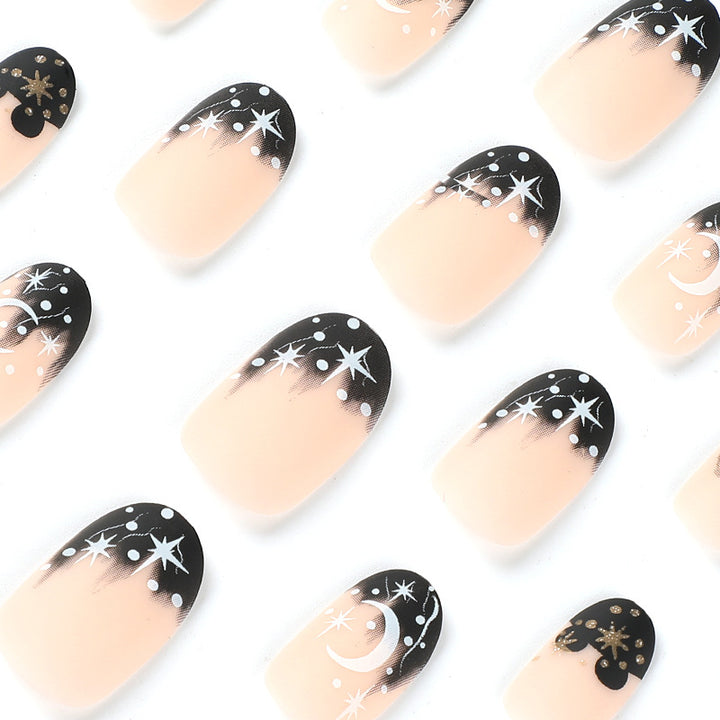 Artistic nail art with moon and star motifs Kalsten