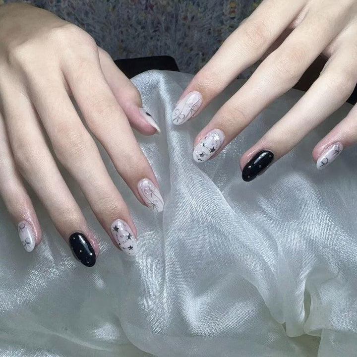 Artistic Star-Themed Press-On Nail Enhancements