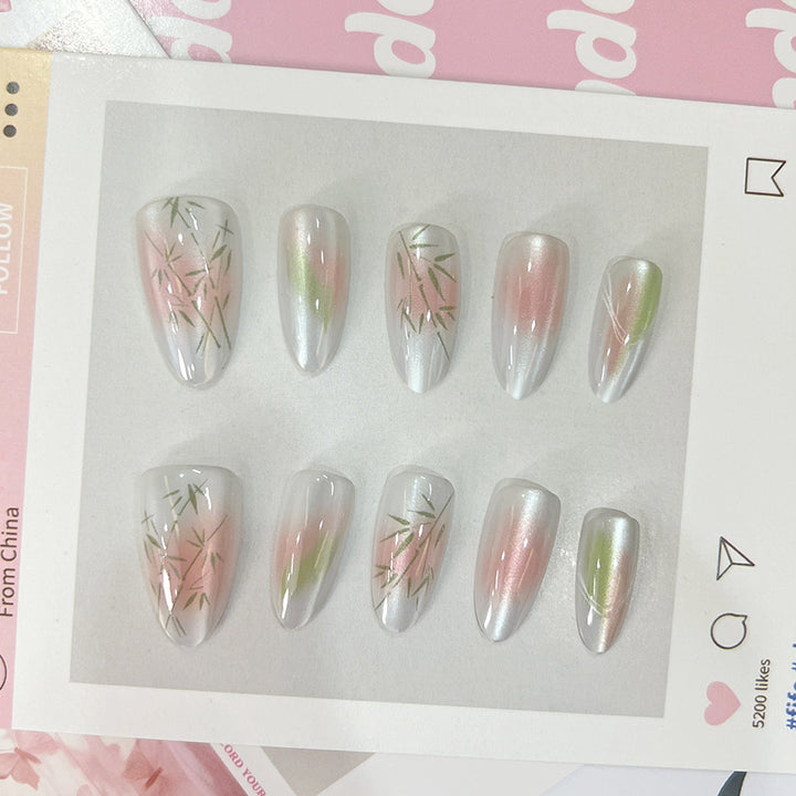 Artificial nail tips with elegant design and botanical accents Kalsten