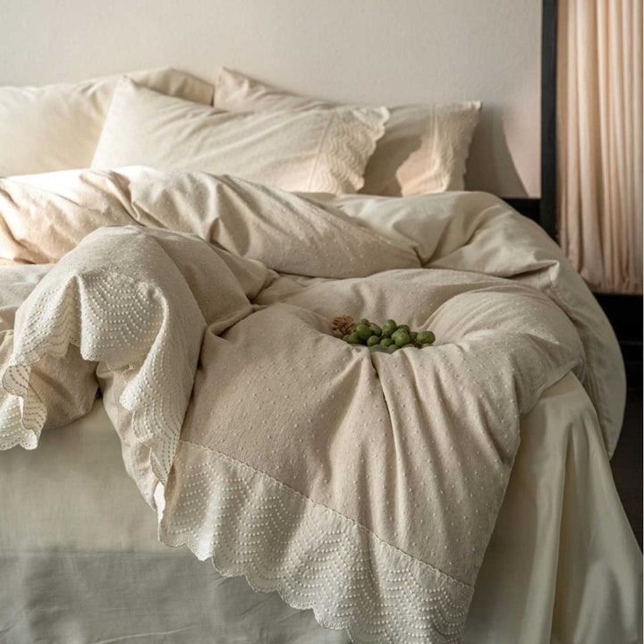 Bedding set with polka dot dobby texture and eyelet embroidery frill
