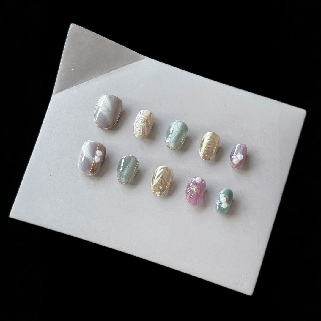Artistic Press-On Nail Set with Pearl and Marble Accents