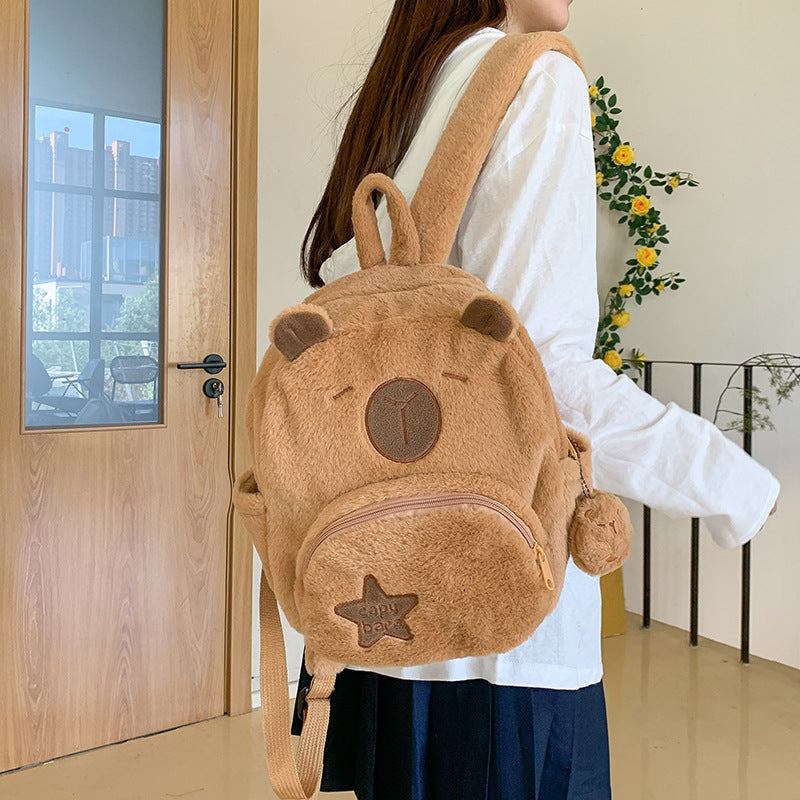 Plush backpack with animal motif and practical compartments Kalsten
