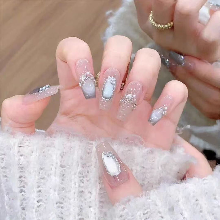 Artistic Jewel-Embellished Acrylic Nail Extensions