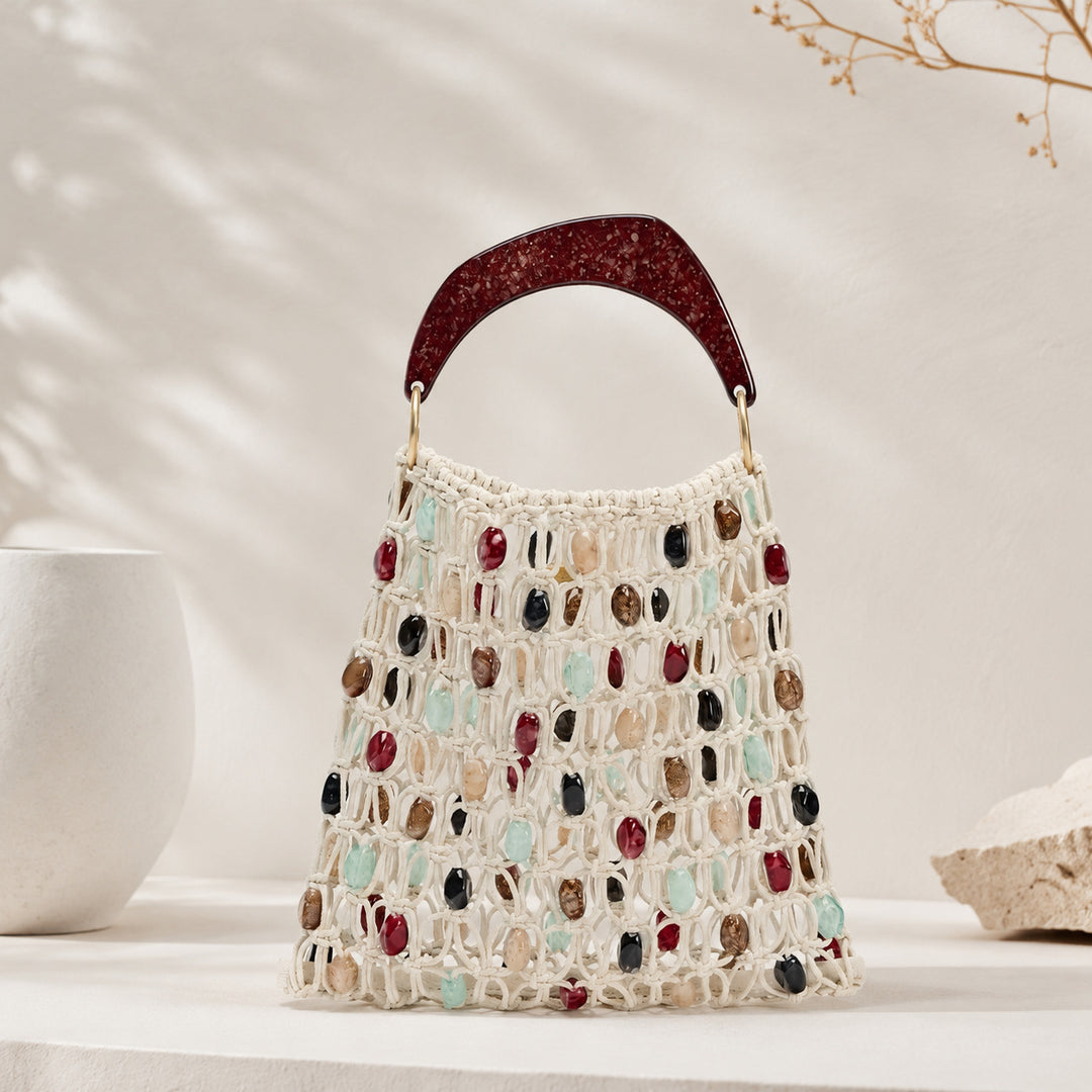 Handcrafted designer shoulder bag with unique stone accents Kalsten