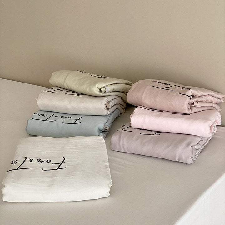 Luxurious cotton satin bedding set with embroidery and contrast piping