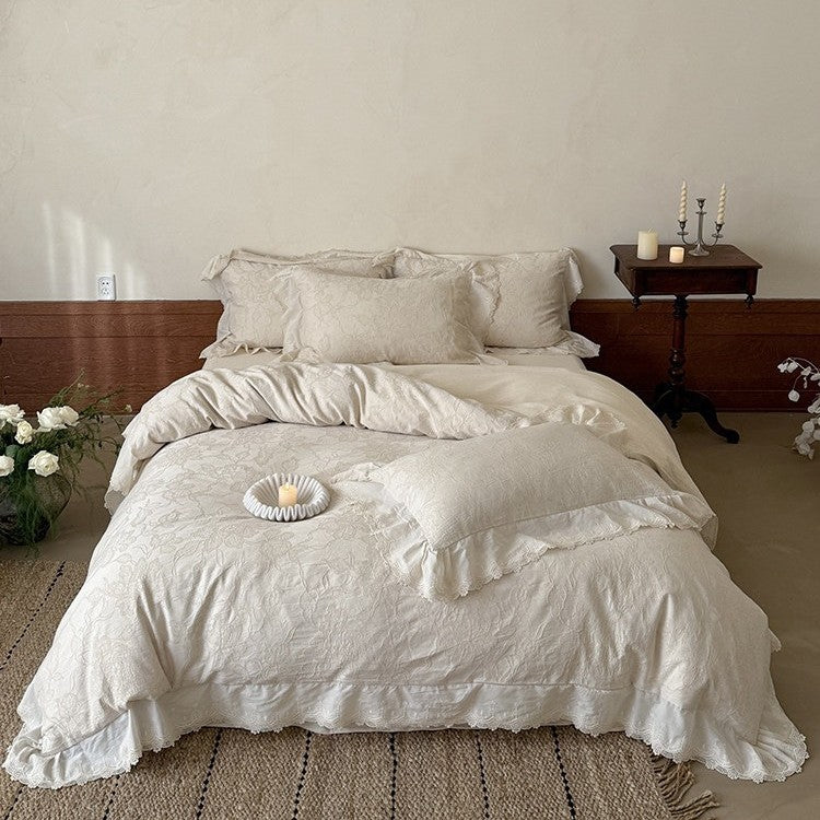 Jacquard bedding set with floral relief pattern and lace border