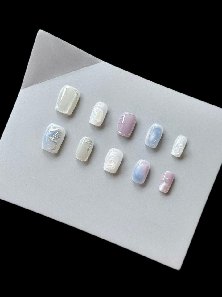 Artistic Press-On Nail Art Set with Pearlescent and Marble Designs
