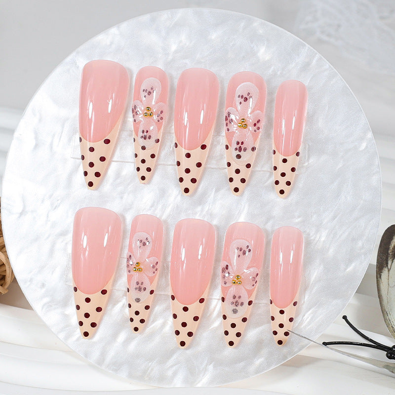 Art nail set with elegant flower and dot designs Kalsten