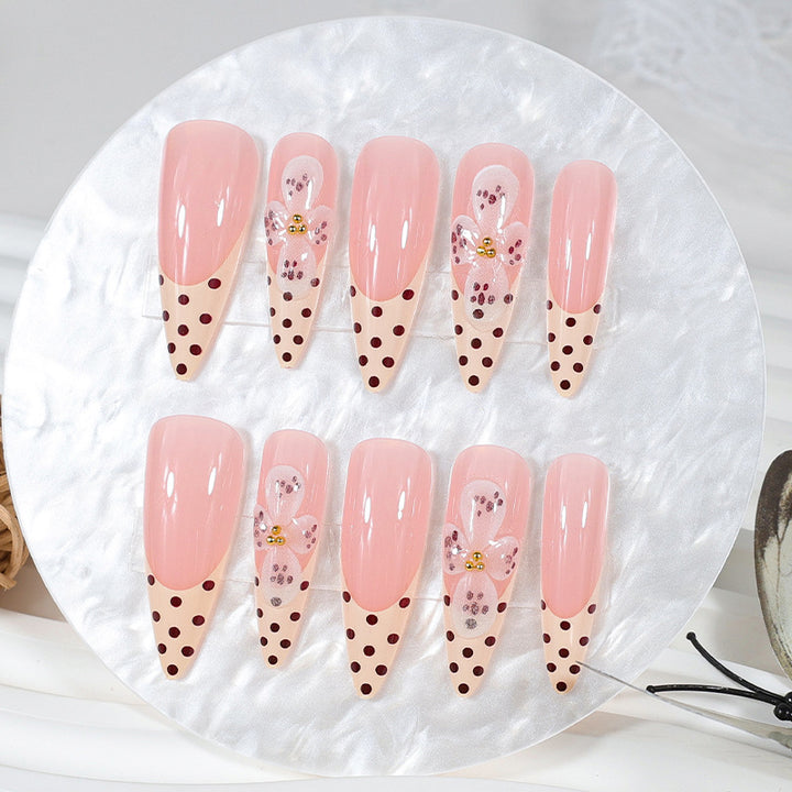Art nail set with elegant flower and dot designs Kalsten