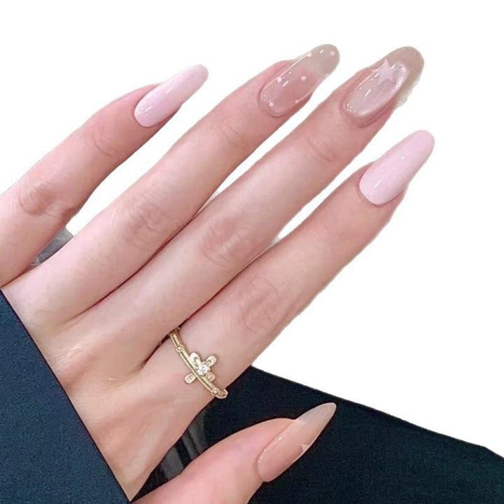 Artistic Star-Embellished Nail Enhancements