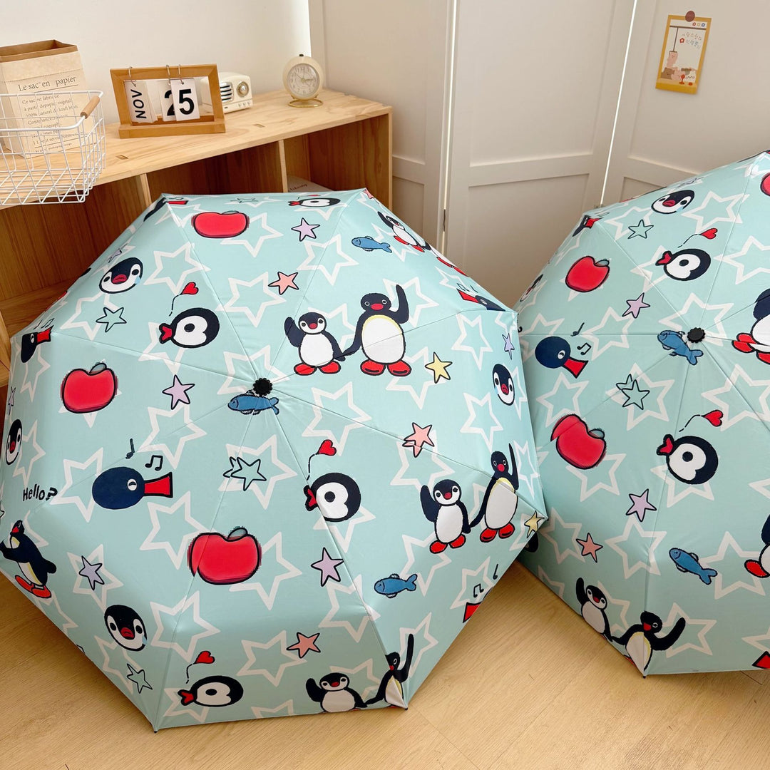 Ladies collapsible umbrella with playful penguin design Kalsten