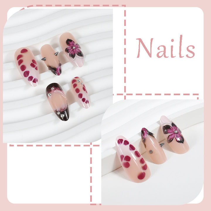 Acrylic nail set with elegant floral design and glossy accents Kalsten