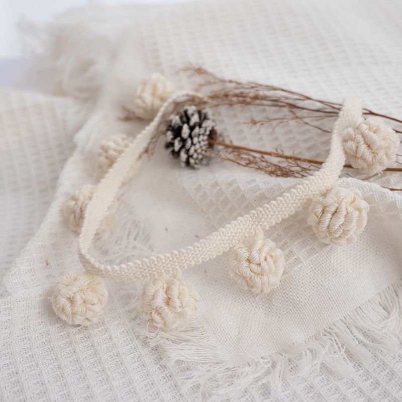 Decorative border with pompons Kalsten
