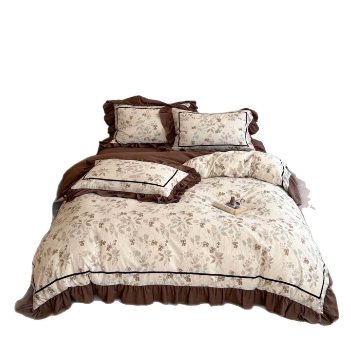 Floral cotton bedding set with ruffles and fine piping