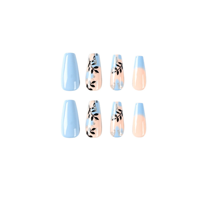 Artful Nail Art with Floral Designs and Glitter Kalsten