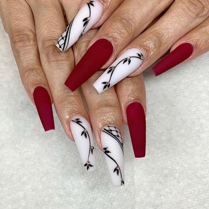 Artistic Long Press-On Nail Set with Floral Accents Kalsten