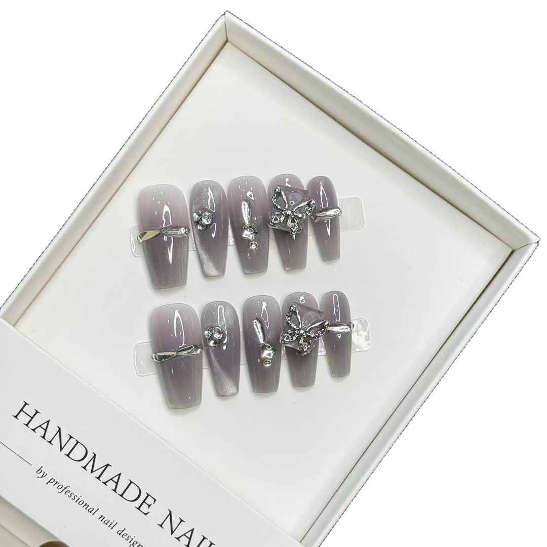 Artistic Press-On Nail Set with Decorative Accents