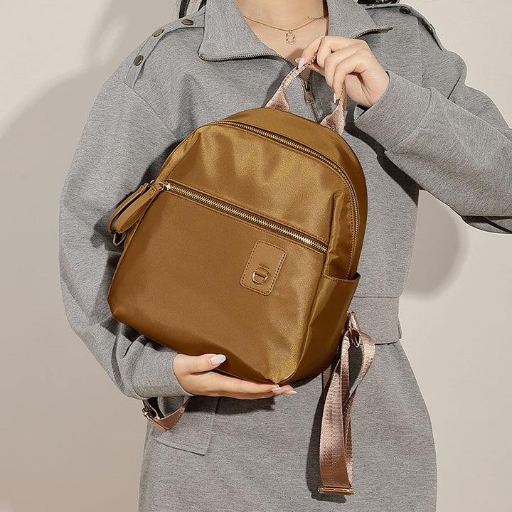 Compact Nylon Backpack with Multiple Pockets