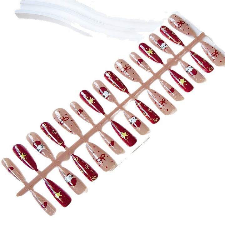 Artificial nails in festive Christmas design Kalsten