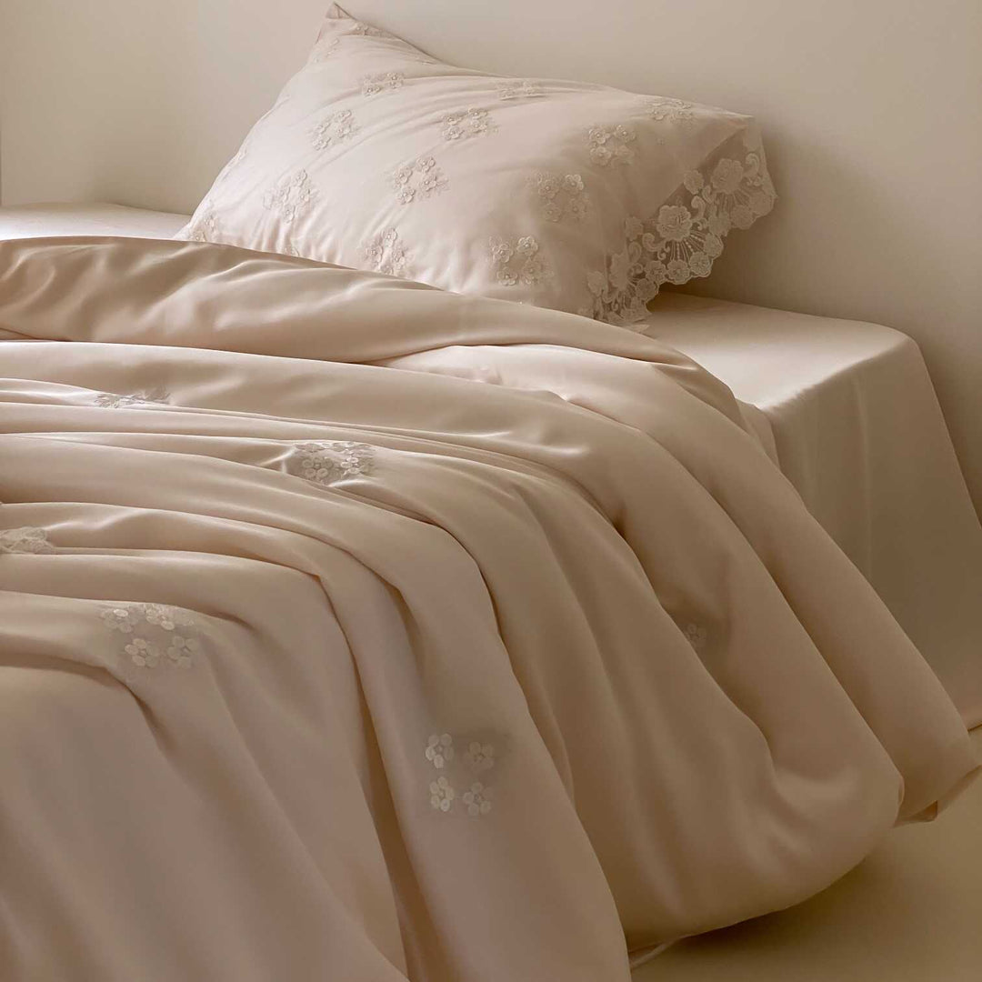 Satin bed linen set with lace trim, floral embroidery & silky touch
