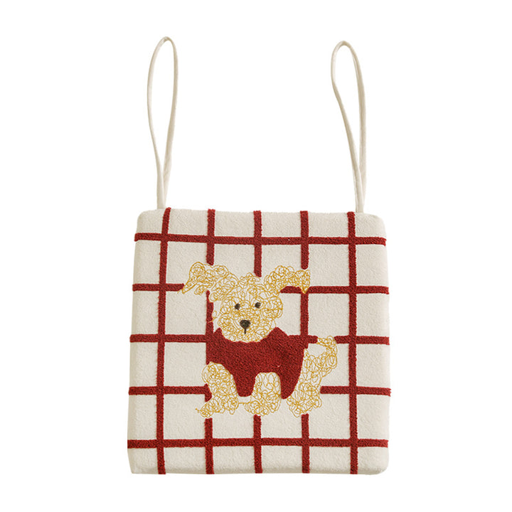 Square seat cushion with appliquéd dog motif, padded filling and attachment straps