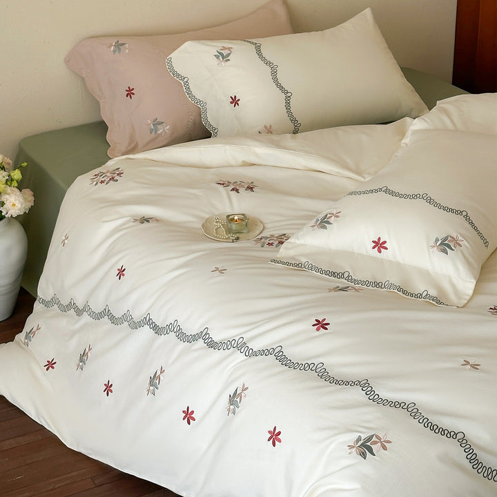 Luxurious embroidered satin bedding set with pillowcase and neck roll