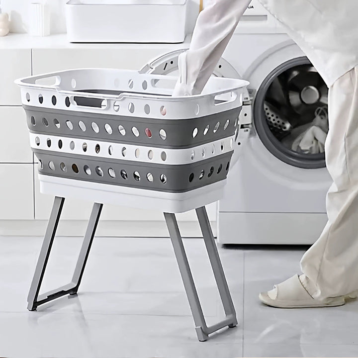 Collapsible laundry basket with wheels, ventilated sides and carrying handles