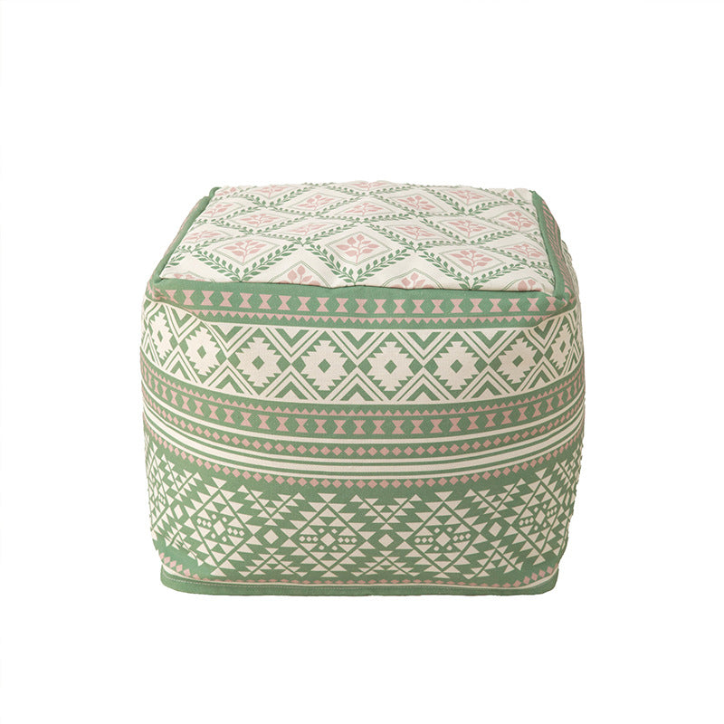 Round floor pouf with ethnic weaving pattern and practical carrying handle Kalsten