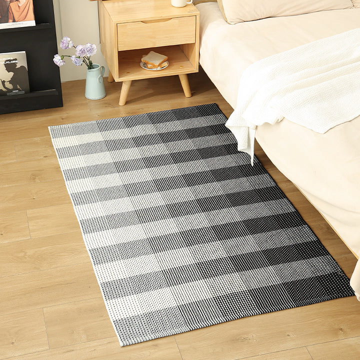 Modern flat-weave area rug with contrasting stripes and non-slip underside Kalsten