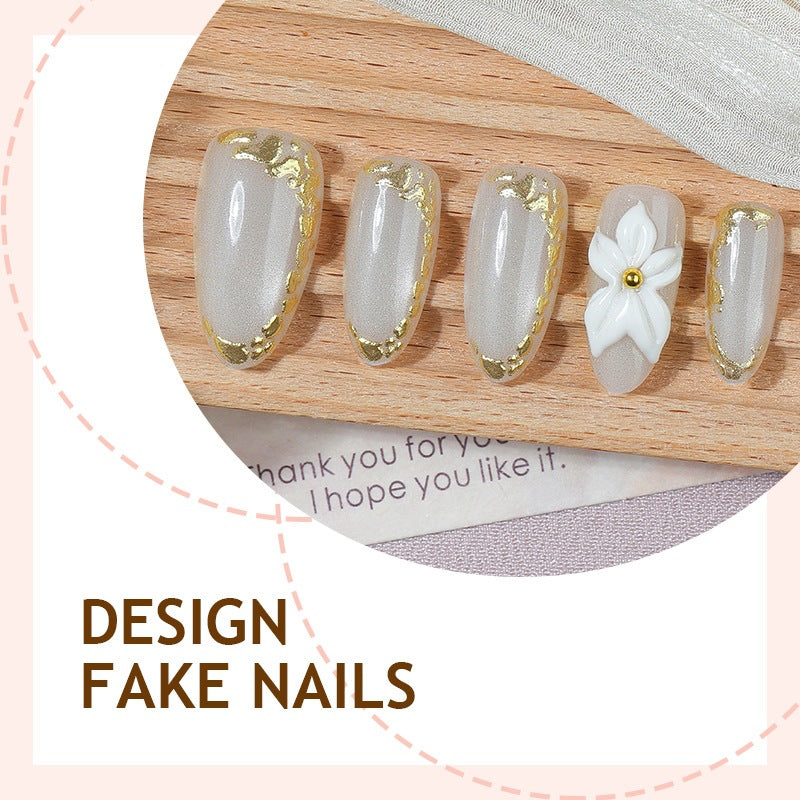 Elegant artificial nail set with gold accents and floral pattern Kalsten
