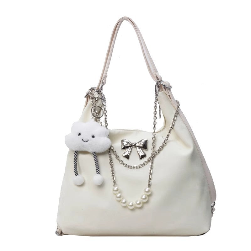 Fashionable handbag with unique pendant and chain accents Kalsten