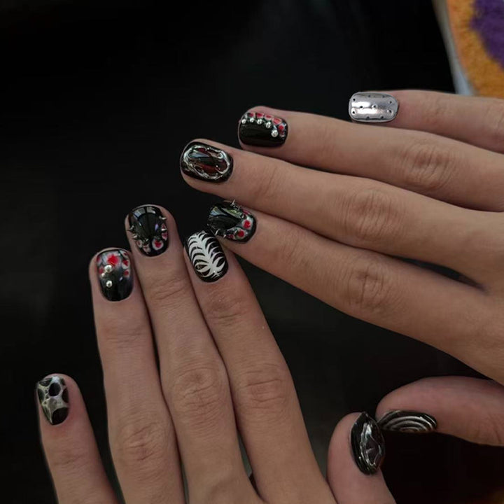 Artificial nail set with creative patterns and glamorous details Kalsten