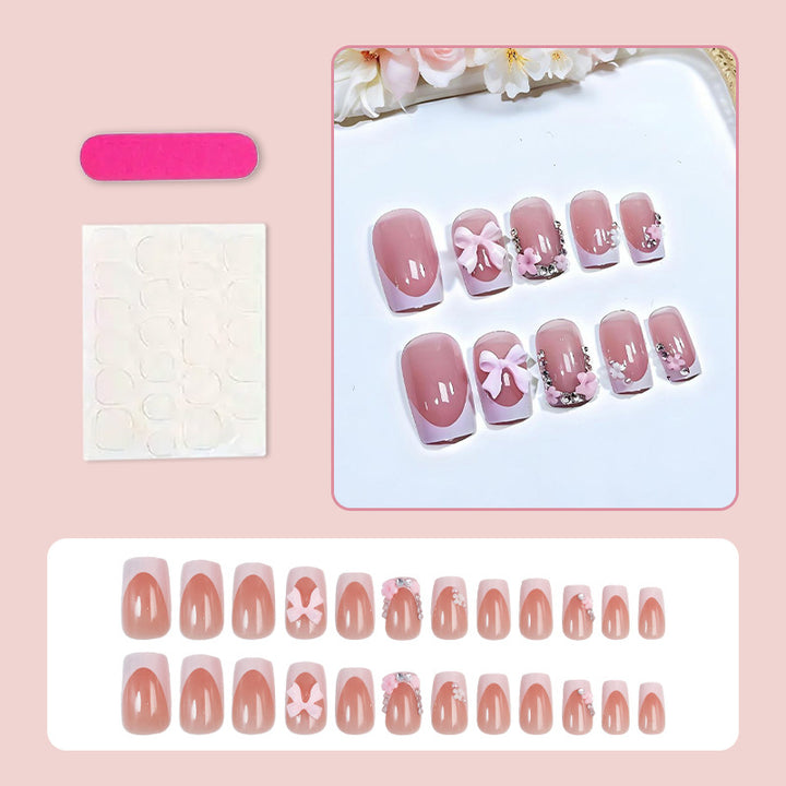 Artificial nail set with playful bows and elegant floral decorations Kalsten