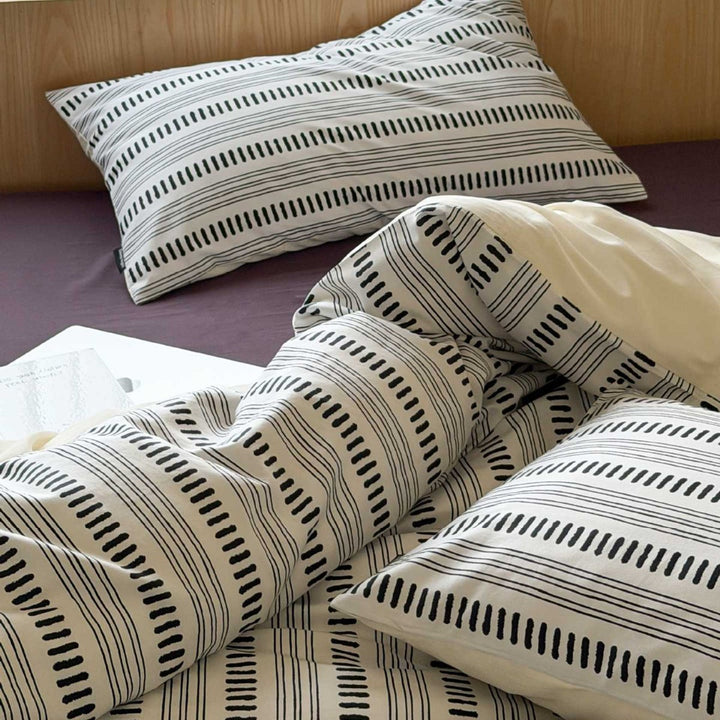 Striped cotton percale bedding set with breathable, wrinkle-free finish and concealed hotel closure