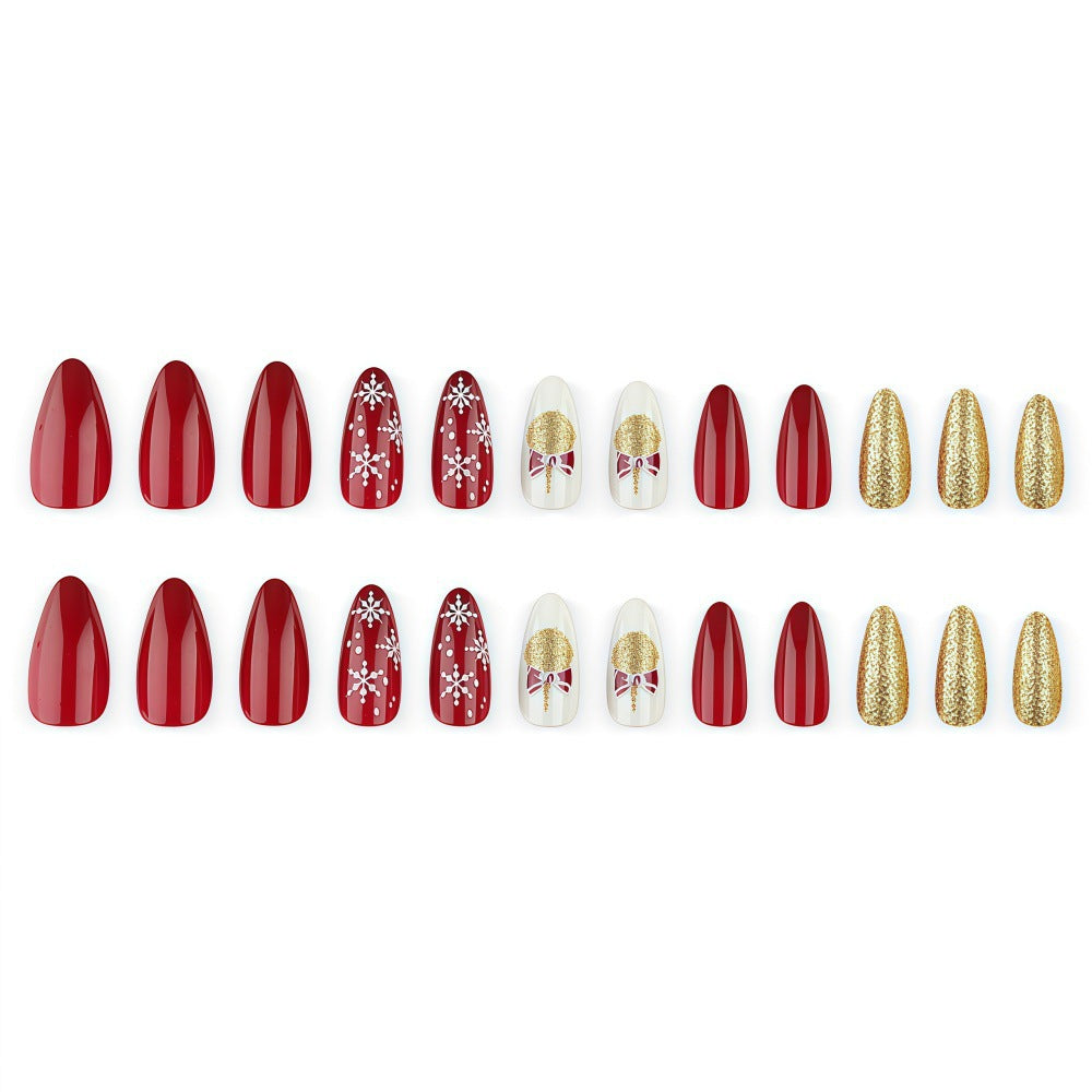 Glamorous artificial nails in festive Christmas design Kalsten