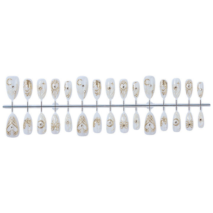Luxury artificial nail set with glitter and jewelry accents Kalsten