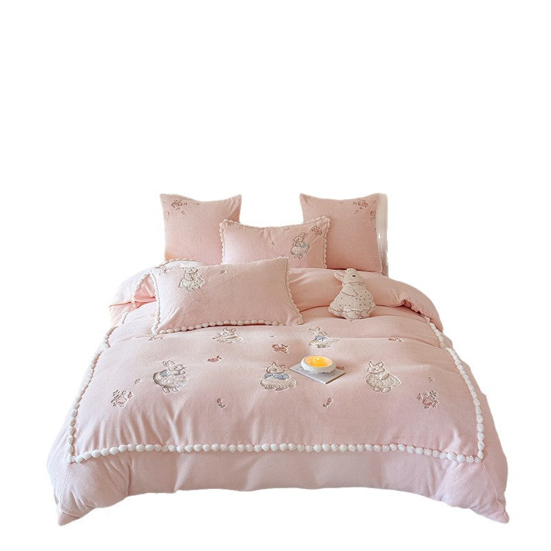 Cute cotton bedding set with embroidered bunny appliqués and pom-pom trim