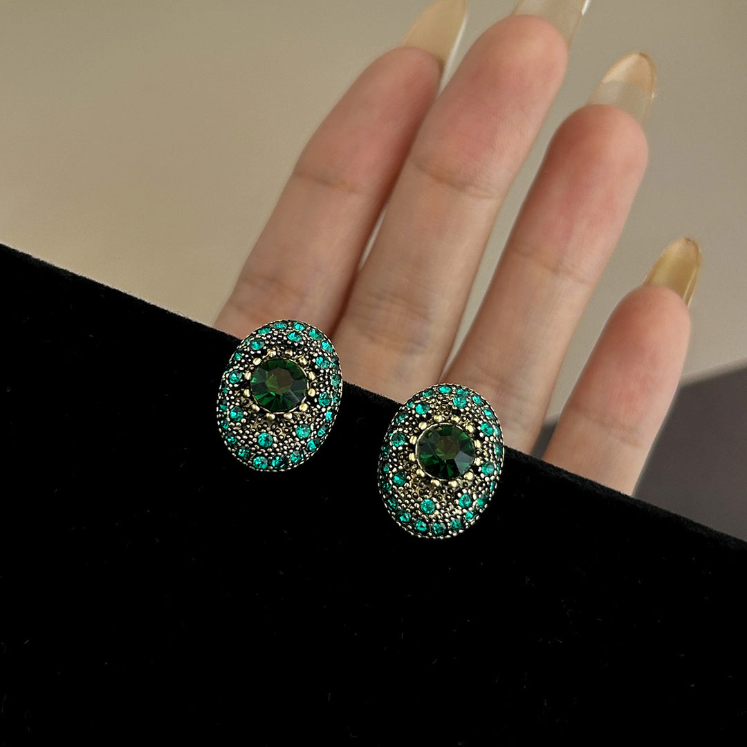 Sparkling stud earrings with intricate details Kalsten