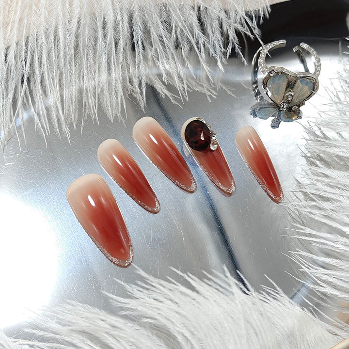 Glittering artificial nails with elegant tip design and crystal decoration Kalsten
