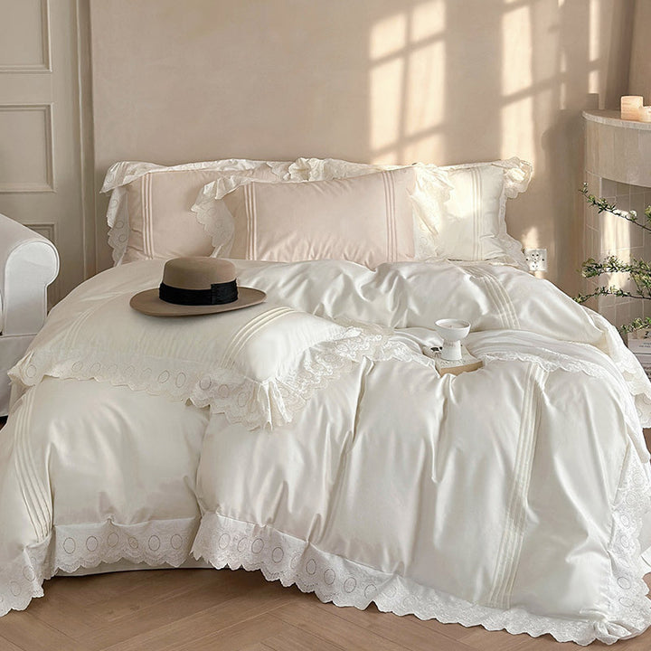 Fine cotton satin bed set with lace, ruffles and decorative stitching