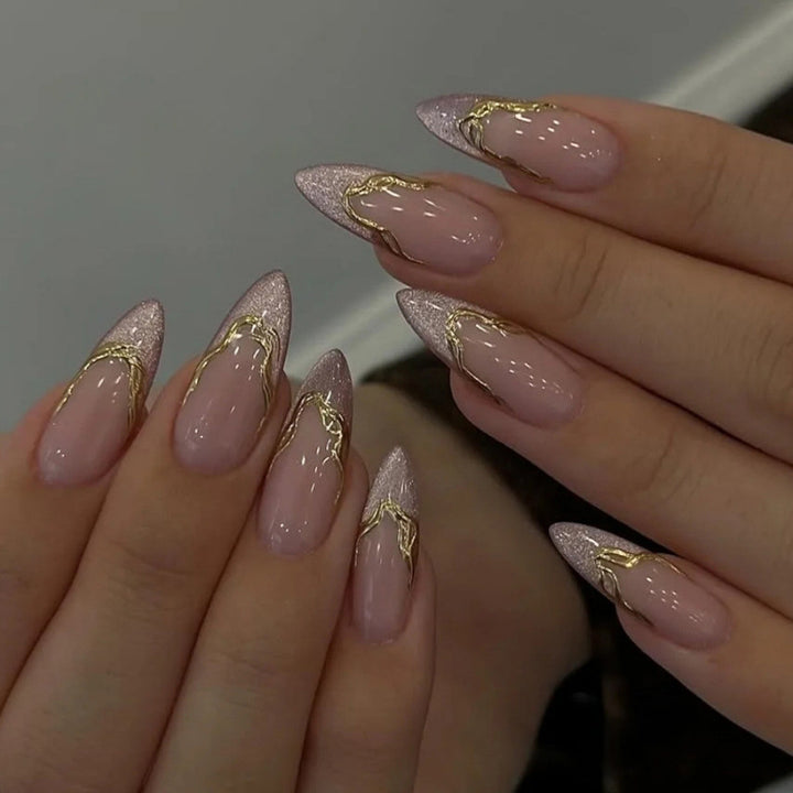Acrylic nail set with glamorous golden accents Kalsten