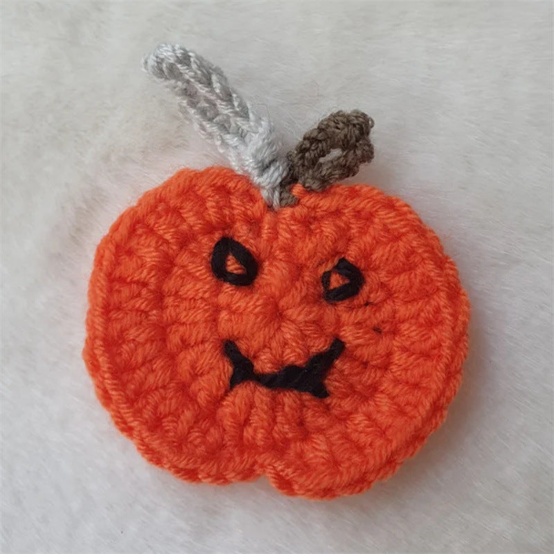 Hand-crocheted pumpkin pot holder and table mat made of cotton yarn