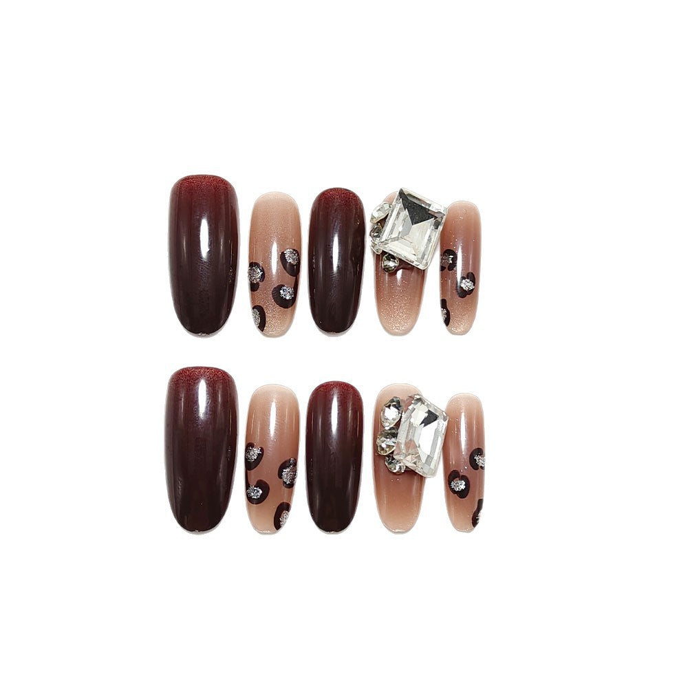 Luxury artificial nails with elegant rhinestone applications Kalsten