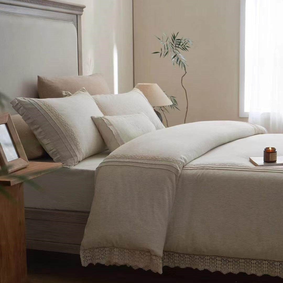 Bedding set in linen look with delicate crochet lace