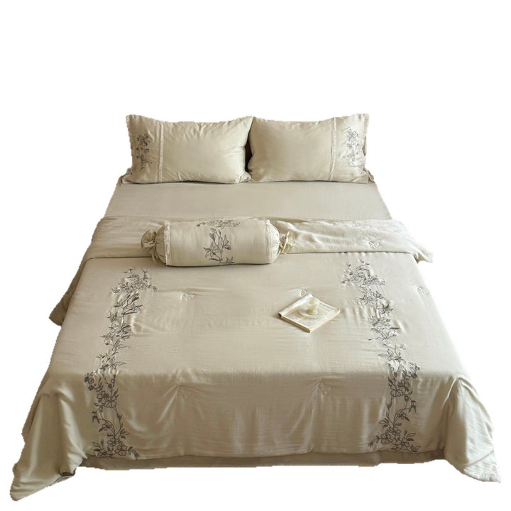 Elegant bedding set made of cotton satin with floral embroidered border and decorative roll cushion Kalsten